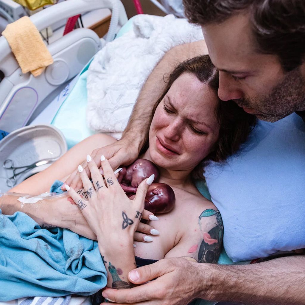 Mother Holding Her Two Premature Babies